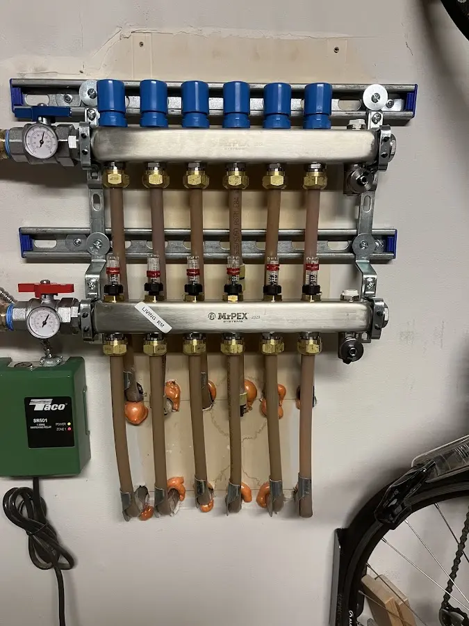 Plumber performing Water Heater Repair at a residential property in Byron